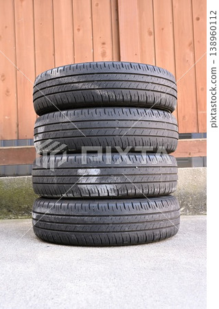 Normal tires stored in the garage Normal tires stored in the garage 138960112