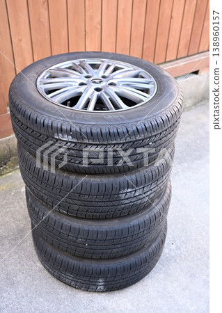 Studded tires stored in the garage 138960157