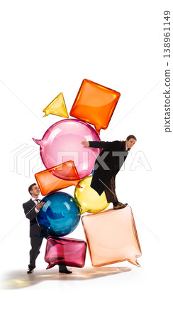 Business professionals balancing colorful speech bubbles representing communication overload. Business professionals balancing colorful speech bubbles representing communication overload. 138961149