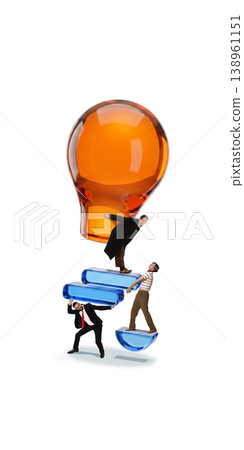 Business people building light bulb together symbolizing idea creation and teamwork Business people building light bulb together symbolizing idea creation and teamwork 138961151