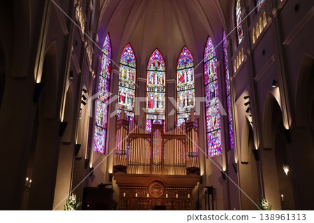 The interior of the cathedral, where magnificent stained glass shines brightly. The interior of the cathedral, where magnificent stained glass shines brightly. 138961313
