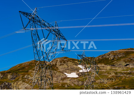 Power line voltage tower in mountains Power line voltage tower in mountains 138961429
