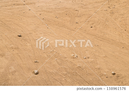 Tire tracks on barren dust on the ground Tire tracks on barren dust on the ground 138961576