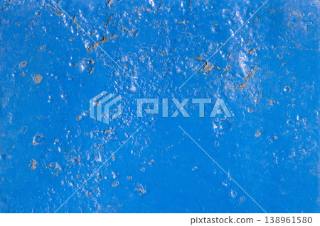 Abstract weathered blue surface with thick gloss peeling paint and rust spots 138961580