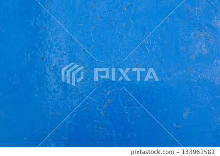 thick blue paint on flat steel surface 138961581