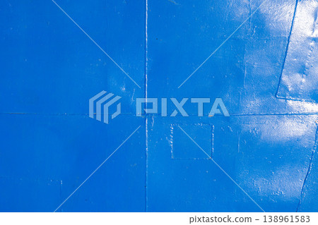 Weathered metal deck floor with welded seams ant thick layer of blue paint. Weathered metal deck floor with welded seams ant thick layer of blue paint. 138961583