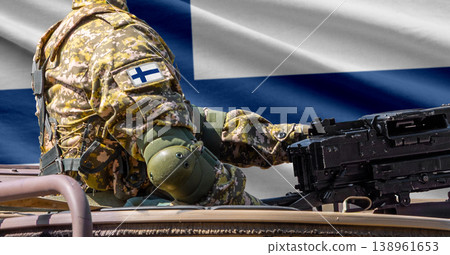 Finland flag with soldier at machinegun turret Finland flag with soldier at machinegun turret 138961653