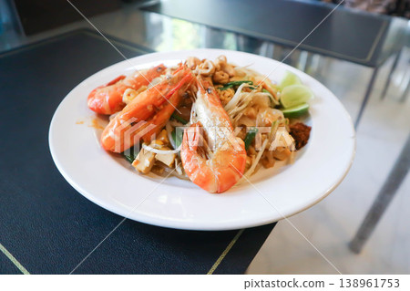 dry prawn noodles or stir fried noodles or pad thai , noodles without soup or Thai food or dry noodles or prawn noodles 138961753