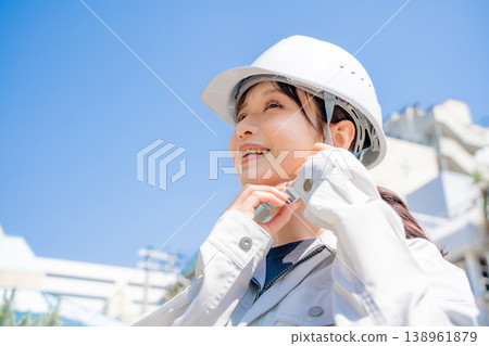 Portrait of a woman in work clothes 138961879