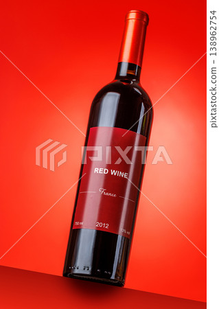Red wine bottle mockup on red background Red wine bottle mockup on red background 138962754