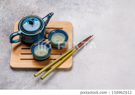 Asian tea ceremony set with teapot and cups Asian tea ceremony set with teapot and cups 138962812