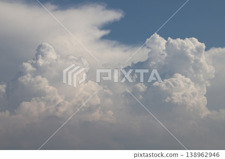 Summer cumulonimbus clouds - two cumulonimbus clouds Summer cumulonimbus clouds - two cumulonimbus clouds 138962946