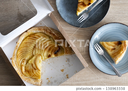 Apple pie slices served on ceramic plates Apple pie slices served on ceramic plates 138963338