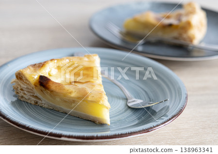 Apple pie slices served on ceramic plates Apple pie slices served on ceramic plates 138963341