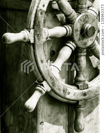 Yachting. Ship wooden steering wheel. Sailboat detail. Yachting. Ship wooden steering wheel. Sailboat detail. 138963373