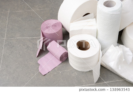 Rolls Of Toilet Paper Towels Hygiene. Roll on gray background Rolls Of Toilet Paper Towels Hygiene. Roll on gray background 138963543