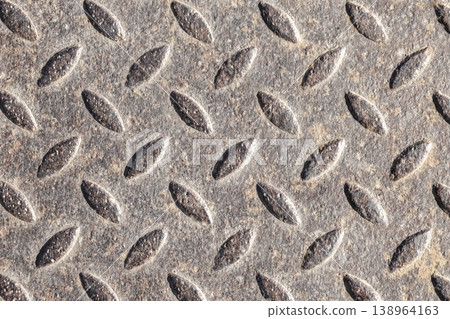 Close-up of a metal diamond plate, background texture Close-up of a metal diamond plate, background texture 138964163