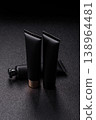 Black empty plastic tube for cream, paste, or shampoo as a mockup. An empty cosmetic tube mockup 138964481