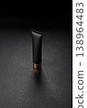 Black empty plastic tube for cream, paste, or shampoo as a mockup. An empty cosmetic tube mockup 138964483