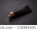 Black empty plastic tube for cream, paste, or shampoo as a mockup. An empty cosmetic tube mockup 138964485