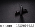 Black empty plastic tube for cream, paste, or shampoo as a mockup. An empty cosmetic tube mockup 138964488