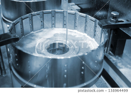 Wire-cut electrical discharge machine. Operation of wire-EDM machine cutting metal parts. Electrical discharge machine EDM cutting metal workpiece. Cutting process by wire cut machine. Metalworking Wire-cut electrical discharge machine. Operation of wire-EDM machine cutting metal parts. Electrical discharge machine EDM cutting metal workpiece. Cutting process by wire cut machine. Metalworking 138964499