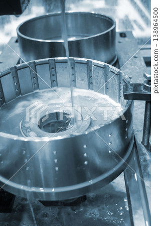 Wire-cut electrical discharge machine. Operation of wire-EDM machine cutting metal parts. Electrical discharge machine EDM cutting metal workpiece. Cutting process by wire cut machine. Metalworking 138964500