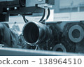 Wire-cut electrical discharge machine. Operation of wire-EDM machine cutting metal parts. Electrical discharge machine EDM cutting metal workpiece. Cutting process by wire cut machine. Metalworking 138964510