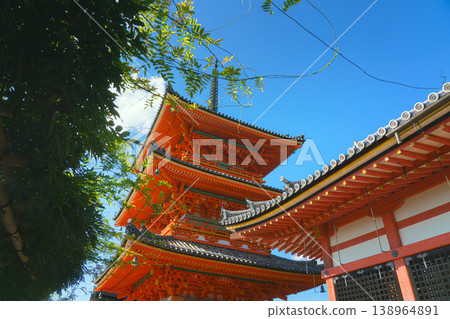 Kyoto, Japan - Oct 11 2024, panoramic view of main building and the pagoda on the territory of Kiyomizu-dera Temple, Monastery of Pure Water, against background of blue sky, at daytime, Kyoto, Japan Kyoto, Japan - Oct 11 2024, panoramic view of main building and the pagoda on the territory of Kiyomizu-dera Temple, Monastery of Pure Water, against background of blue sky, at daytime, Kyoto, Japan 138964891