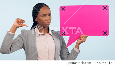 Portrait, speech bubble and mockup with a business black woman pointing in studio on a gray background. Review, information or announcement and a young employee holding space with tracking markers Portrait, speech bubble and mockup with a business black woman pointing in studio on a gray background. Review, information or announcement and a young employee holding space with tracking markers 138965217