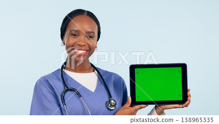 Green screen, doctor and portrait of black woman with tablet for telehealth, wellness and medical news. Healthcare, mockup and person on digital tech for clinic website in studio blue background 138965335