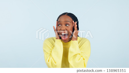 Wow, surprise and mind blown with a black woman in studio on a gray background to hear good news. Emoji, announcement and expression with a happy young person looking shocked by a promo or bonus Wow, surprise and mind blown with a black woman in studio on a gray background to hear good news. Emoji, announcement and expression with a happy young person looking shocked by a promo or bonus 138965351