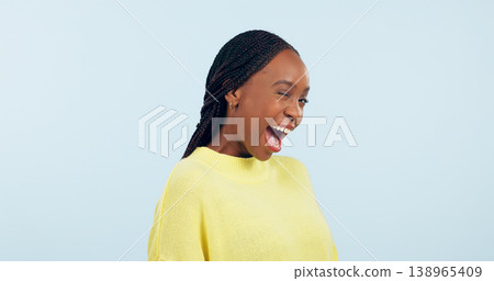 Wink, flirty and portrait of a black woman on a studio background for love, conversation or a smile. Happy, mockup space and an African person with facial expression for a secret or confident 138965409