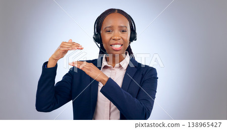Call center, customer support and portrait of black woman in studio talking, speaking and consulting. Telemarketing service, communication and person with headset for contact on gray background 138965427