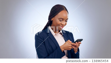 Business woman, studio and smartphone for reading notification, mobile chat and social network. Happy african worker scroll on cellphone, news app and search digital information on grey background 138965454