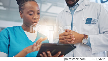 Tablet, doctors and collaboration for online research at hospital in healthcare and medical discussion. Professional people, consulting and communication for results, medicine and help in clinic Tablet, doctors and collaboration for online research at hospital in healthcare and medical discussion. Professional people, consulting and communication for results, medicine and help in clinic 138965694