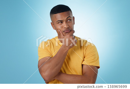 Man, face and thinking in decision, choice or planning for idea or memory against a blue studio background. Unsure male person or curious model in wonder, remember or solution in why, emoji or mockup 138965699