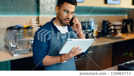 Waiter, phone call and tablet for restaurant communication, online management or customer service in cafe. Small business owner, barista or cashier man on mobile and digital tech for coffee shop data Waiter, phone call and tablet for restaurant communication, online management or customer service in cafe. Small business owner, barista or cashier man on mobile and digital tech for coffee shop data 138965713