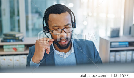 Computer, call center and support with a black man consultant working in customer service for assistance. Contact, crm and headset communication with an employee consulting in an office for sales Computer, call center and support with a black man consultant working in customer service for assistance. Contact, crm and headset communication with an employee consulting in an office for sales 138965773