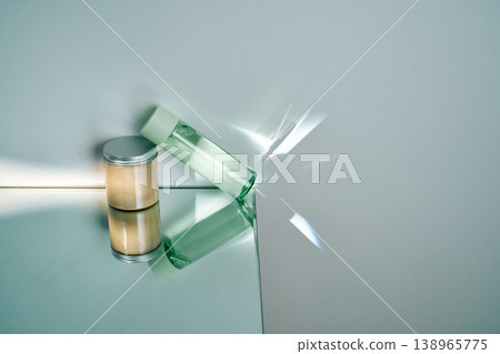 Cosmetic products reflecting light on mirror surface 138965775