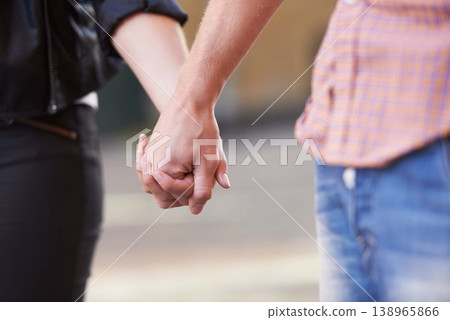 Love, closeup and couple holding hands in a city walking, bonding and enjoy weekend freedom outdoor. Trust, travel and people in New York for adventure, fun and explore, holiday or vacation together Love, closeup and couple holding hands in a city walking, bonding and enjoy weekend freedom outdoor. Trust, travel and people in New York for adventure, fun and explore, holiday or vacation together 138965866