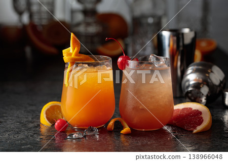 Summer refreshing cocktails with ice, orange and grapefruit juice. Summer refreshing cocktails with ice, orange and grapefruit juice. 138966048