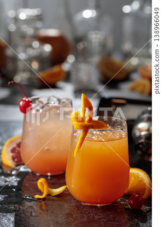 Summer refreshing cocktails with ice, orange and grapefruit juice. 138966049