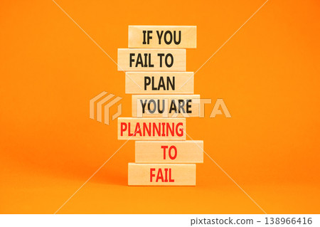 Planning to fail symbol. Concept words If you fail to plan you are planning to fail on beautiful wooden blocks. Beautiful orange paper background. Business planning to fail concept. Copy space. Planning to fail symbol. Concept words If you fail to plan you are planning to fail on beautiful wooden blocks. Beautiful orange paper background. Business planning to fail concept. Copy space. 138966416