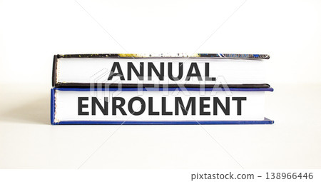 Annual enrollment words symbol. Concept words Annual enrollment on beautiful books. Beautiful white background. Medical and Annual enrollment words concept. Copy space. 138966446