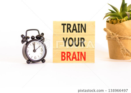Train your brain words symbol. Concept words Train your brain on beautiful wooden blocks. Beautiful white background. Black alarm clock. Business motivational and train your brain concept. Copy space 138966497
