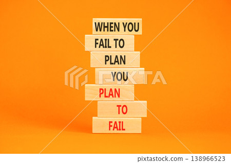 Planning to fail symbol. Concept words When you fail to plan you plan to fail on beautiful wooden blocks. Beautiful orange paper background. Business planning to fail concept. Copy space. Planning to fail symbol. Concept words When you fail to plan you plan to fail on beautiful wooden blocks. Beautiful orange paper background. Business planning to fail concept. Copy space. 138966523