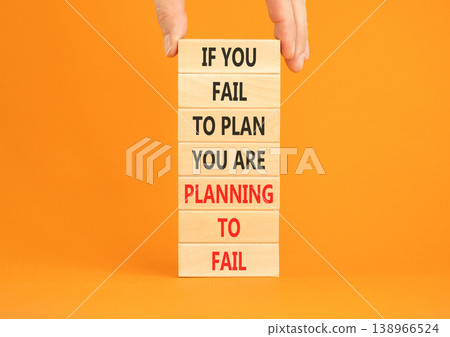 Planning to fail symbol. Concept words If you fail to plan you are planning to fail on beautiful wooden blocks. Beautiful orange paper background. Business planning to fail concept. Copy space. Planning to fail symbol. Concept words If you fail to plan you are planning to fail on beautiful wooden blocks. Beautiful orange paper background. Business planning to fail concept. Copy space. 138966524