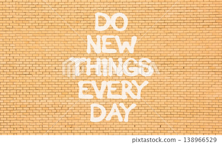 Do new things every day words symbol. Concept words Do new things every day on beautiful brick wall. Beautiful brick wall background. Business do new things every day concept. Copy space. 138966529
