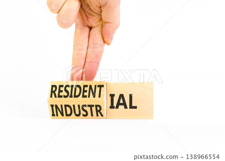 Industrial or residential symbol. Concept words Industrial or Residential on beautiful wooden blocks. Beautiful white background. Business industrial or residential concept. Copy space. 138966554